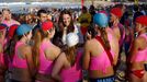 Catherine, the Duchess of Cambridge, meets with junior surf lifesavers during her visit to a surf lifesaving demonstration at Sydney's Manly beach