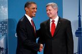 ...či americká hlava státu Barack Obama, který během zdravice s kanadským premiérem Stephenem Harperem nasadil svůj nezaměnitelný úsměv.
