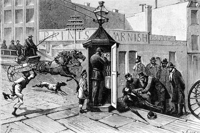 První telefonní budka v Chicagu v USA. Rok 1882