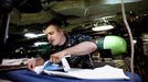 April 25, 2011 - Fort Lauderdale, Florida, U.S. - -- Fort Lauderdale, Fla. -- Don Mikolajczak, Machinist's Mate Chief Senior, irons his dress whites in the the USS Annapolis (SSN 760), a S6G nuclear reactor powered fast attack submarine, sailing from Cape Canaveral on Sunday. The USS Annapolis measures 362 ft. in length and 33 ft. at the beam, a diving depth of over 400 ft., 27+ mph, 12 vertical launch missile tubes, 4 torpedo tubes, and a crew of 130 enlisted submariners. The submarine was commissioned April 11, 1992 with its homeport in Groton, Connecticut. USS Annapolis sailed to the 21st Anniversary of Fleet Week at Port Everglades, Fort Lauderdale. (Credit Image: © Gary Coronado/The Palm Beach Post)