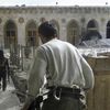 Zničená mešita v Aleppu