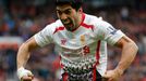 Liverpool's Suarez celebrates after scoring his side's third goal during their English Premier League soccer match against Manchester United at Old Trafford in Manchester