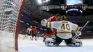 Chicago Blackhawks center Andrew Shaw scores the game-winning goal in triple-overtime past Boston Bruins goalie Tuukka Rask (40) during Game 1 of their NHL Stanley Cup Fi