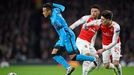 Barcelona's Neymar in action with Arsenal's Alex Oxlade-Chamberlain and Hector Bellerin