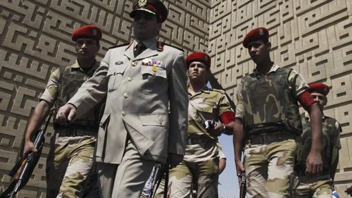 Members of the army walk at the tomb of late President Anwar Sadat during the 40th anniversary of Egypt's attack on Israeli forces in the 1973 war, at Cairo's Nasr City district, October 6, 2013.