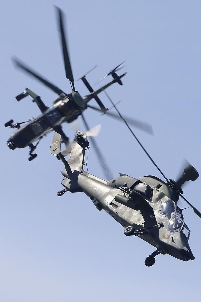 Eurocopter Tiger H61 helicopters take part in a flying display, during the opening of the 50th Paris Air Show, at the Le Bourget airport near Paris, June 17, 2013. The Paris Air Show runs from June 17 to 23. REUTERS/Pascal Rossignol (FRANCE - Tags: TRANSPORT BUSINESS MILITARY)