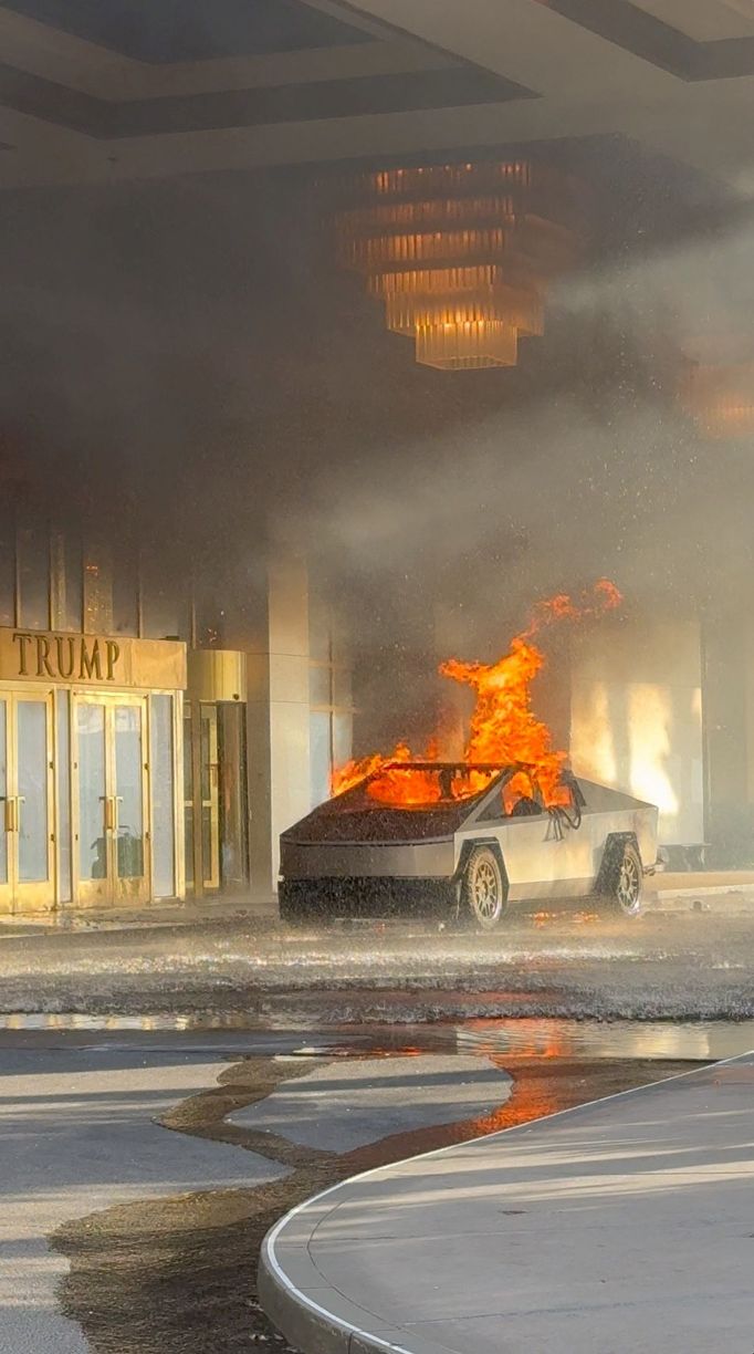 Flames rise from a Tesla Cybertruck after it exploded outside the Trump International Hotel Las Vegas, in Las Vegas, Nevada, U.S., January 1, 2025 in this screengrab take