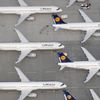 File aerial photo shows Lufthansa planes parked on the tarmac of the closed Frankfurt's airport