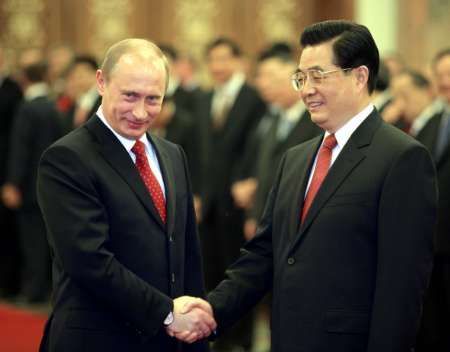 Ruský prezident Vladimír Putin a jeho čínský protivník Chu Ťin-tchao