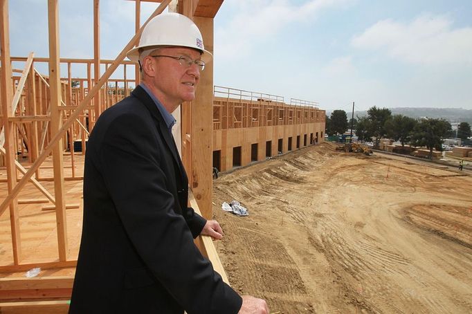 San Diego California News - May 9, 2012 May 9, 2012 - Carlsbad - May 9, 2012, Carlsbad, California, USA_|Peter Ronchetti, the General Manager of Legoland, takes a look from a second floor room of the park's 250 room hotel that's under construction. A swimming pool is planned for the open space at lower right.|