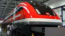 File picture shows workers as they polish a prototype of the new maglev Transrapid high-speed train at the ThyssenKrupp plant in the central German city of Kassel March 23, 2007. A planned high-speed rail link between the Bavarian capital Munich and its airport will probably not be built because of a cost overrun, a source in Germany's ruling coalition said on March 27, 2008. Picture taken March 23, 2007. REUTERS/Alex Grimm/File (GERMANY)