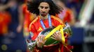 Soccer Football - Euro 2024 - Final - Spain v England - Berlin Olympiastadion, Berlin, Germany - July 14, 2024 Spain's Marc Cucurella celebrates with the trophy after win