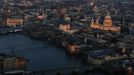 ATTENTION EDITORS - EMBARGOED FOR PUBLICATION TO 00:01 GMT JANUARY 11, 2013 St Paul's cathedral is lit by the early morning sun in an aerial view taken from The View gallery at the Shard, western Europe's tallest building, in London January 8, 2013. The View, the public viewing deck accessible by high speed elevators on the 309 metre (1013 feet) Shard building, opens on February 1. Picture taken January 8, 2013. REUTERS/Stefan Wermuth (BRITAIN - Tags: TRAVEL CITYSCAPE) TEMPLATE OUT Published: Led. 10, 2013, 12:06 odp.