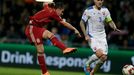 Alcacer of Spain scores past Skrtel Slovakia during their Euro 2016 qualification soccer match at the MSK stadium in Zilina