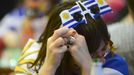 A Uruguayan soccer fan reacts during an open air broadcast of the 2014 World Cup Group D soccer match between Costa Rica and Uruguay, in Montevideo June 14, 2014. REUTERS