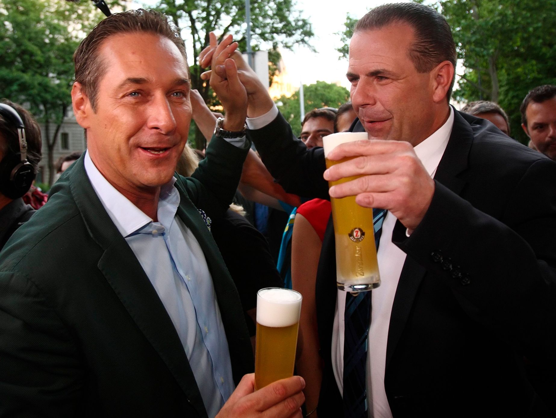 Head of Austria's far-right FPOe Strache and top candidate Vilimsky celebrate after European Parliament elections in Vienna