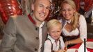 FC Bayern Munich's Robben, his wife Bernadien and their son pose during their visit at the Oktoberfest in Munich