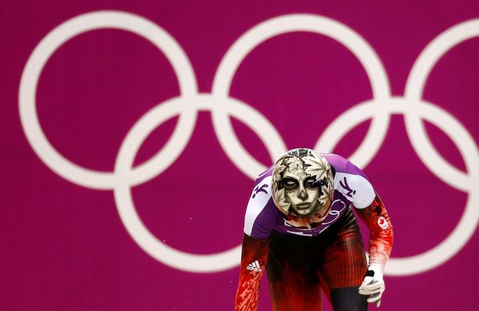 Canada's Sarah Reid starts during a women's skeleton training at the Sanki sliding center in Rosa Khutor, a venue for the 2014 Sochi Winter Olympics, near Sochi, February