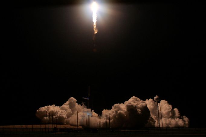 A SpaceX Falcon 9 rocket, carrying the Crew Dragon spacecraft, lifts off on an uncrewed test flight to the International Space Station from the Kennedy Space Center in Ca