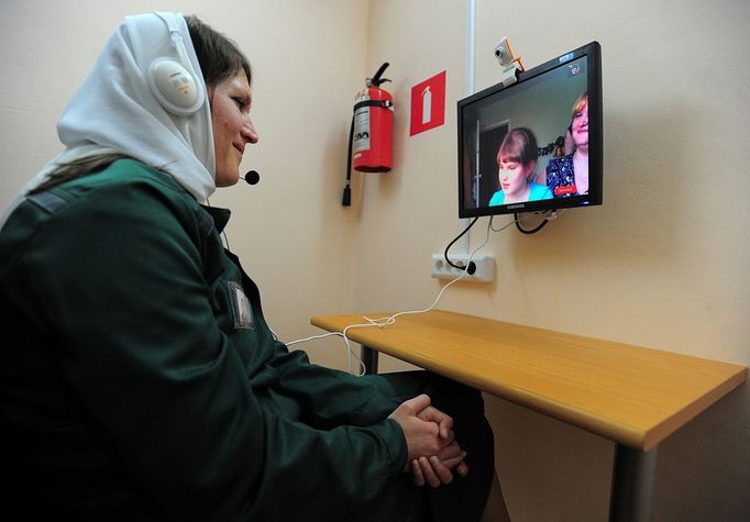 Ivanovo Region prison colony for convicted women IVANOVO REGION, RUSSIA. APRIL 25, 2012. A convicted woman makes a video calls to her relatives at Women's Prison Colony No3 of the Ivanovo Region branch of the Russian Federal Service of Execution of Sentences (UFSIN), seen through an open window.