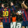 Barcelona's Lionel Messi celebrates with team-mate Luis Suarez after scoring a goal against Paris St Germain during their Champions League Group F soccer match at the Nou Camp stadium in Barcelona