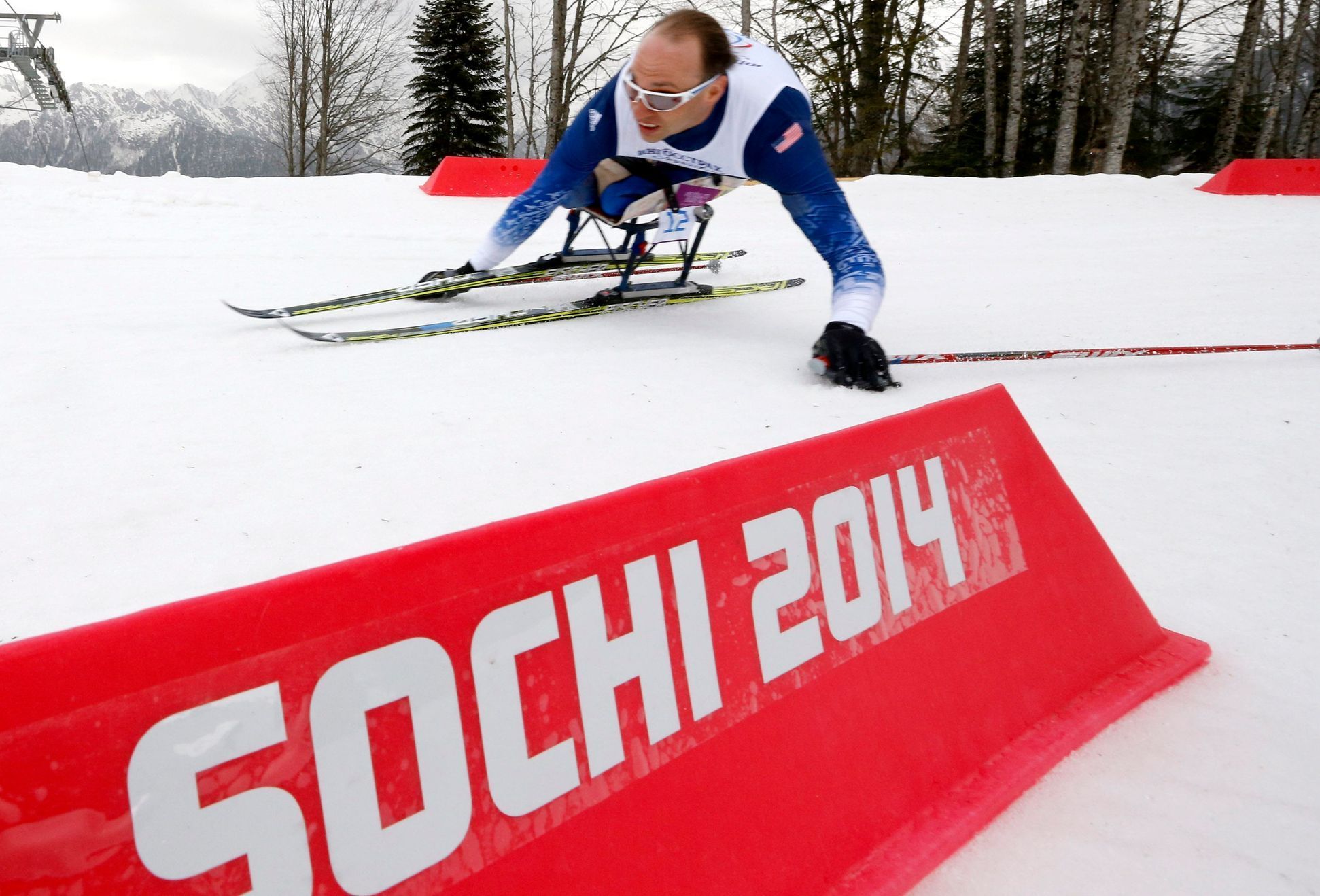 Andrew of the U.S skis during the men's 15 km cross-country sitting at the 2014 Sochi Paralympic Winter Games in Rosa Khutor