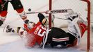 Boston Bruins' Daniel Paille collides with Chicago Blackhawks goalie Corey Crawford during the third period in Game 1 of their NHL Stanley Cup Finals hockey series in Chi