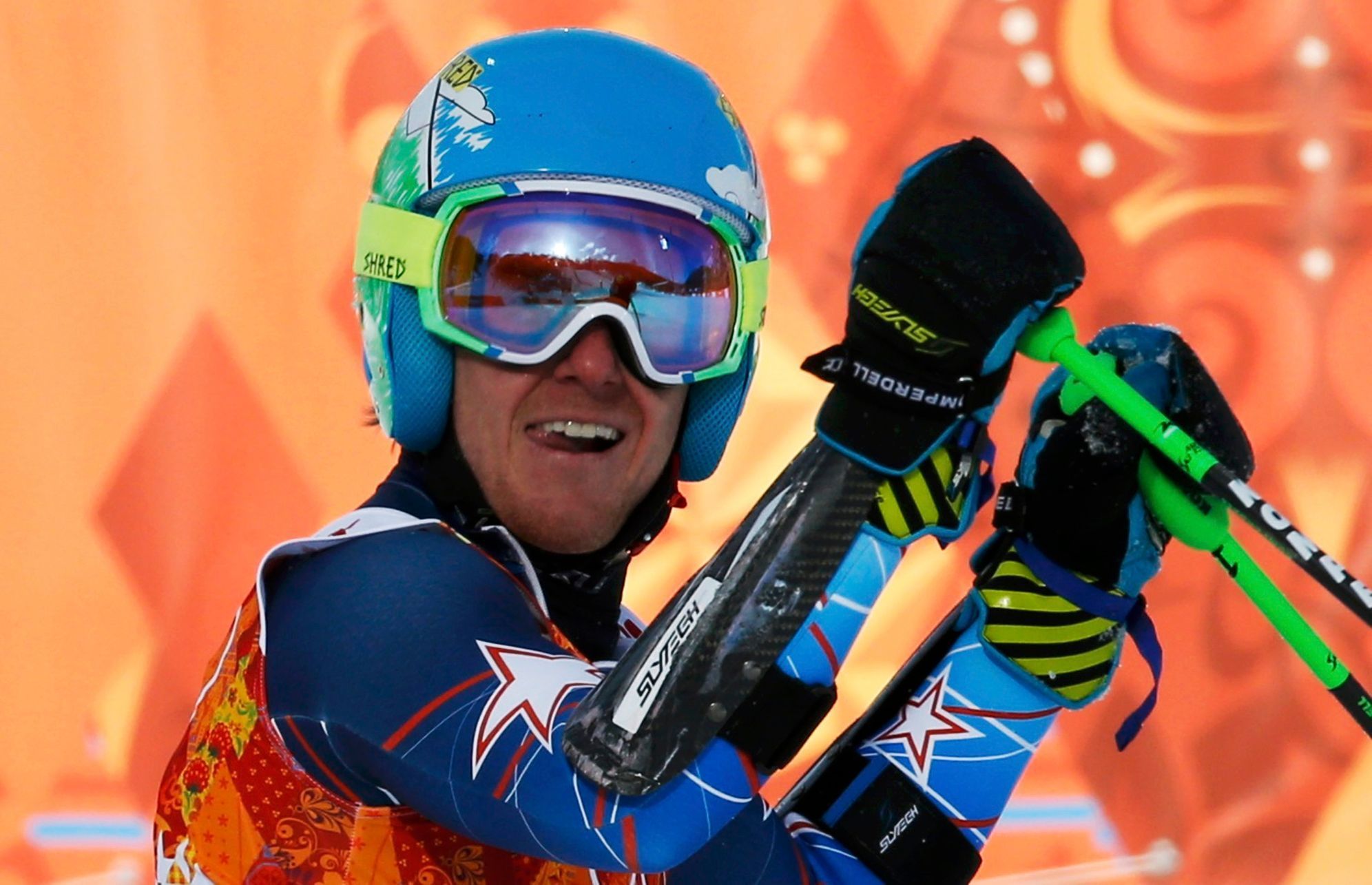 Ligety of the U.S. smiles after the second run of the men's alpine skiing giant slalom event at the 2014 Sochi Winter Olympics
