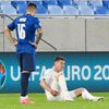fotbal, kvalifikace Euro 2020 play off - Slovensko - Irsko James McCarthy reacts after sustaining an injury alongside Slovakia’s Robert Mazáň