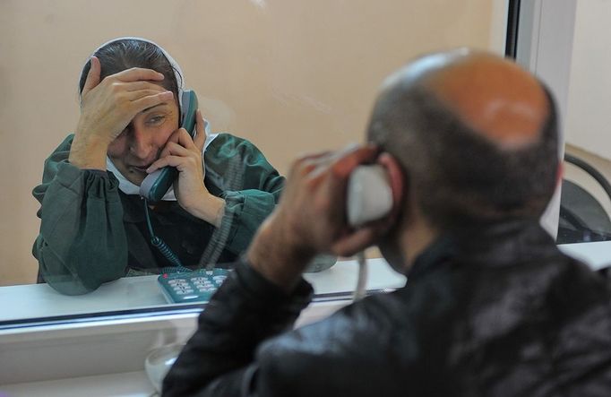 Ivanovo Region prison colony for convicted women IVANOVO REGION, RUSSIA. APRIL 25, 2012. A convicted woman speaks to a relative or friend by telephone through a glass wall at Women's Prison Colony No3 of the Ivanovo Region branch of the Russian Federal Service of Execution of Sentences (UFSIN), seen through an open window