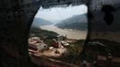 A view of the outskirts of Badong city, on the banks of the Yangtze River, 100km (62 miles) from the Three Gorges dam in Hubei province in this August 7, 2012 file photo. China relocated 1.3 million people during the 17 years it took to complete the Three Gorges dam. Even after finishing the $59 billion project last month, the threat of landslides along the dam's banks will force tens of thousands to move again. It's a reminder of the social and environmental challenges that have dogged the world's largest hydroelectric project. While there has been little protest among residents who will be relocated a second time, the environmental fallout over other big investments in China has become a hot-button issue ahead of a leadership transition this year. Picture taken on August 7, 2012. To match story CHINA-THREEGORGES/ REUTERS/Carlos Barria/Files (CHINA - Tags: POLITICS ENVIRONMENT BUSINESS ENERGY) Published: Srp. 22, 2012, 8:44 odp.