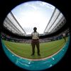 A soldier stands on Centre Court at the Wimbledon Tennis Cha