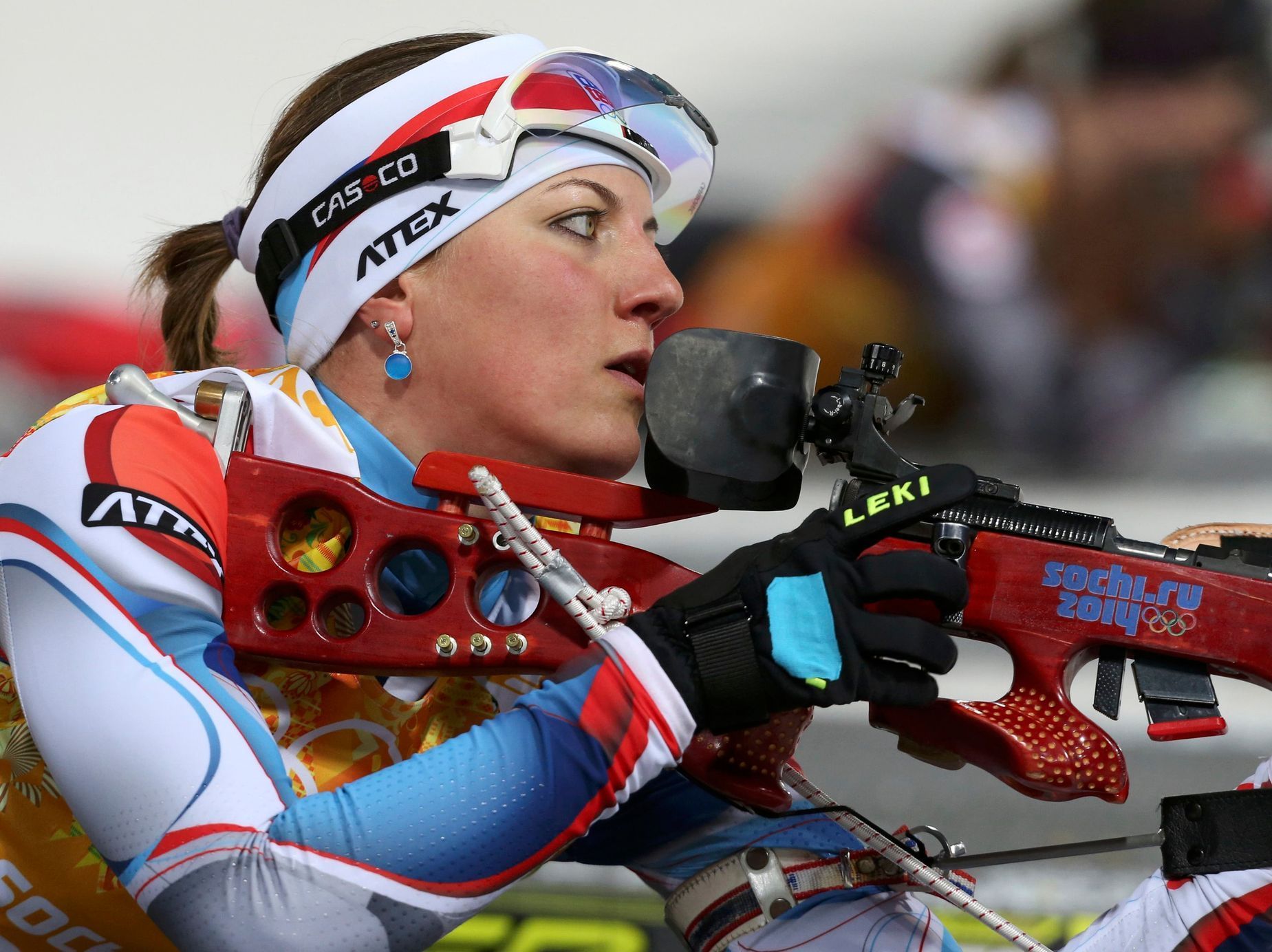 Czech Republic's Landova prepares to shoot during women's biathlon 4x6 km relay at Sochi 2014 Winter Olympic Games