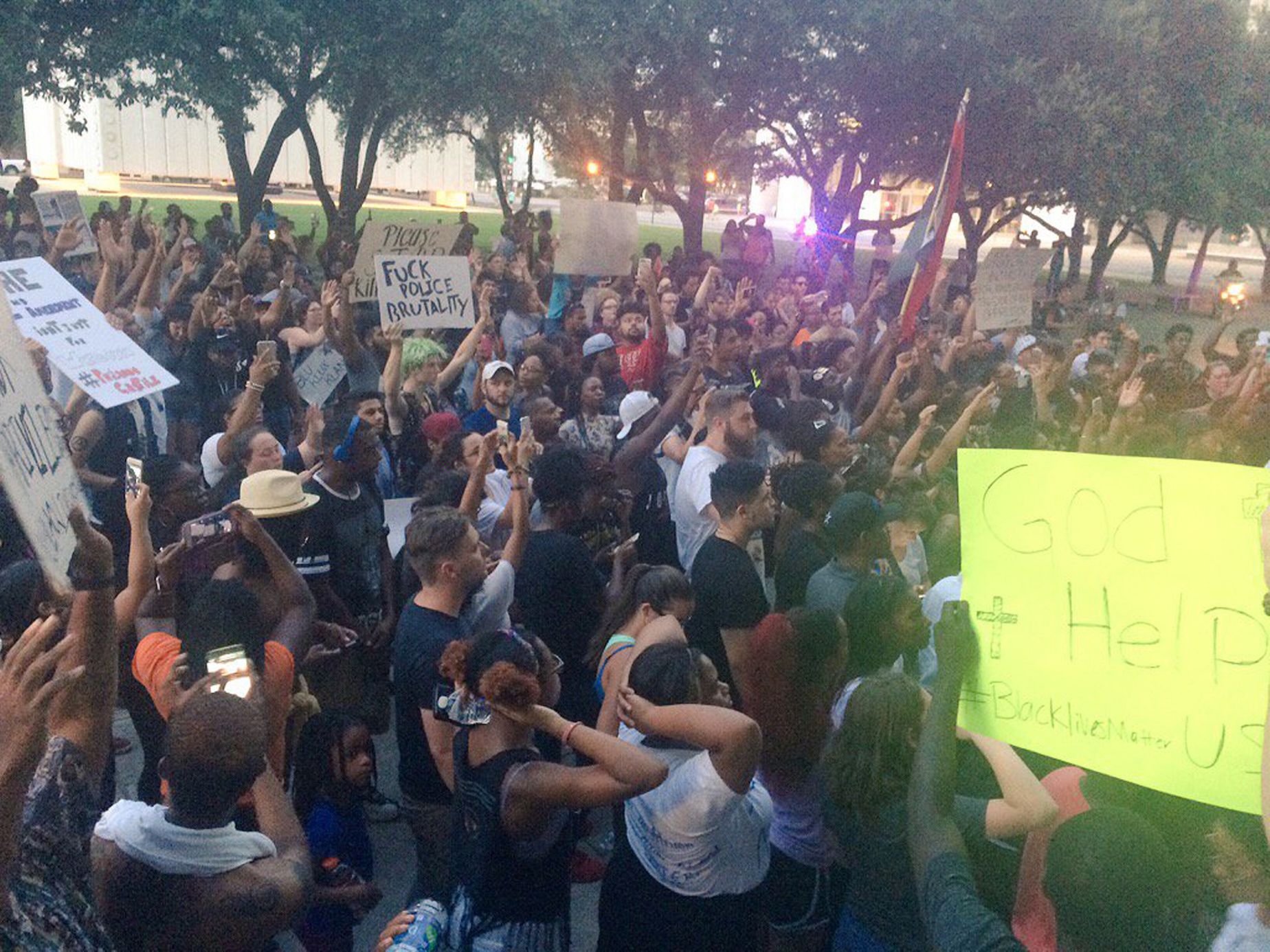 Marchers protest against police shootings of two black men in Louisiana and Minnesota during a demonstration in Dallas