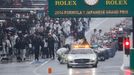 Cars line up behind the safety car in the pit lane as the race is suspended due to rain conditions during the Japanese F1 Grand Prix at the Suzuka Circuit October 5, 2014