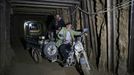 A tricycle used in smuggling is seen in a car-smuggling a tunnel and spare parts beneath the border between Egypt and southern Gaza Strip in Rafah . by Wissam Nassar.