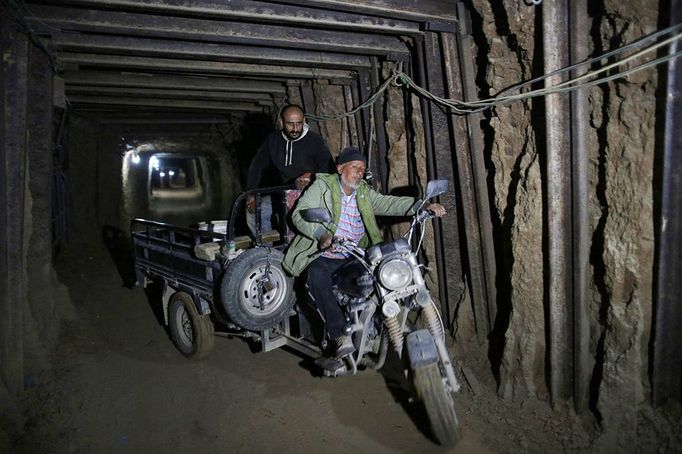 A tricycle used in smuggling is seen in a car-smuggling a tunnel and spare parts beneath the border between Egypt and southern Gaza Strip in Rafah . by Wissam Nassar.