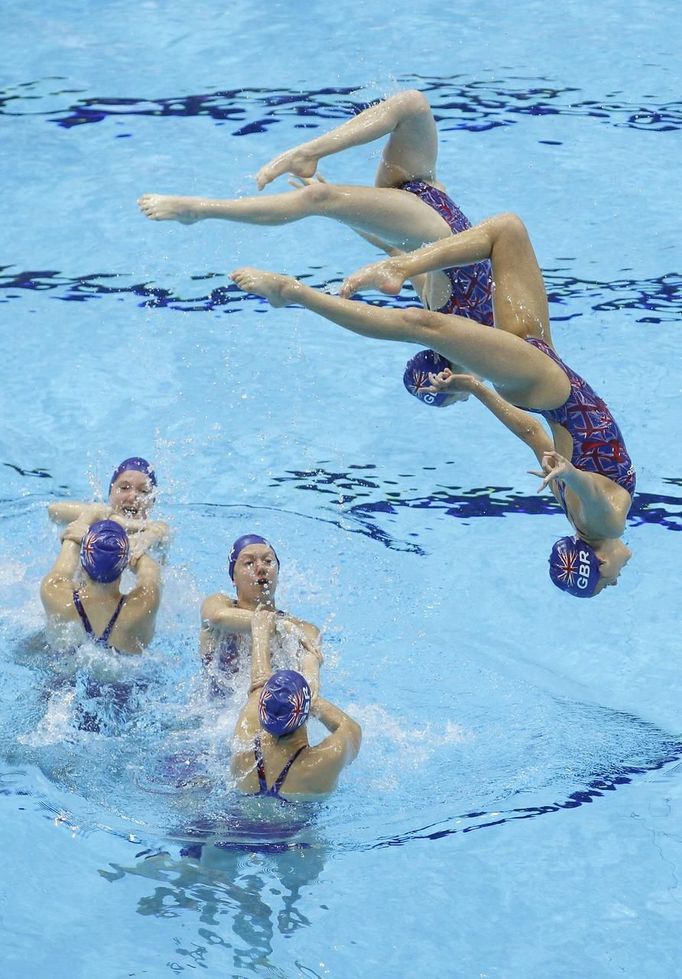 The Great Britain synchronised swimming team practise a routine at the Olympic Park in Stratford, East London