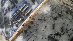 Still image taken from handout aerial footage shot by a drone shows the shell craters at the Sergey Prokofiev International Airport damaged by shelling during fighting between pro-Russian separatists