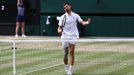 Tennis - Wimbledon - All England Lawn Tennis and Croquet Club, London, Britain - July 14, 2024 Serbia's Novak Djokovic reacts during his men's singles final against Spain