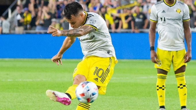 Jul 17, 2021; Columbus, Ohio, USA; Columbus Crew midfielder Lucas Zelarayan (10) scores a goal on a free kick as forward Miguel Berry spins away from a New York City FC d