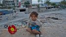 11 Titulek: Albanian gypsies face poverty in Greece Popis: October 22, 2011, Athens, Greece: October 22, 2011 - Athens, Greece: Gypsy girl plays with a plastic flower in the gypsy township. 800 Albanian gypsies live under extreme unhealthy conditions since 2000 in a township on an occupied, private property, only three km below Acropolis. Greek authorities are not able to transfer the gypsies to another legal land in order to gain access to clean water, sanitary and electricity- due to financial crisis. (Maro Kouri / polaris). In October 2013, an unidentified girl, called "Maria," was found in a Greek gypsy camp and could be related to missing child cases. Over 8,000 calls about the girl from all over the world including the U.S. and Canada have been received inquiring about the child. The blond girl, approximately age 4, was found in a Roma gypsy settlement in central Greece. DNA tests proved that she was not related to the 39-year-old man and 40-year-old woman who claimed to be her parents.