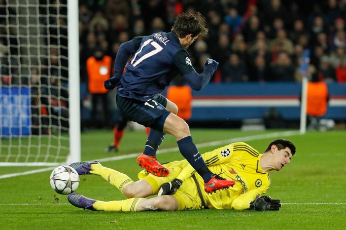 Chelsea's Thibaut Courtois saves from Paris St Germain's Maxwell