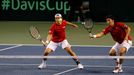 Japan's Uchiyama hits a return beside his compatriot Ito during their Davis Cup quarter-final men's doubles tennis match against Czech Republic's Stepanek and Rosol in To