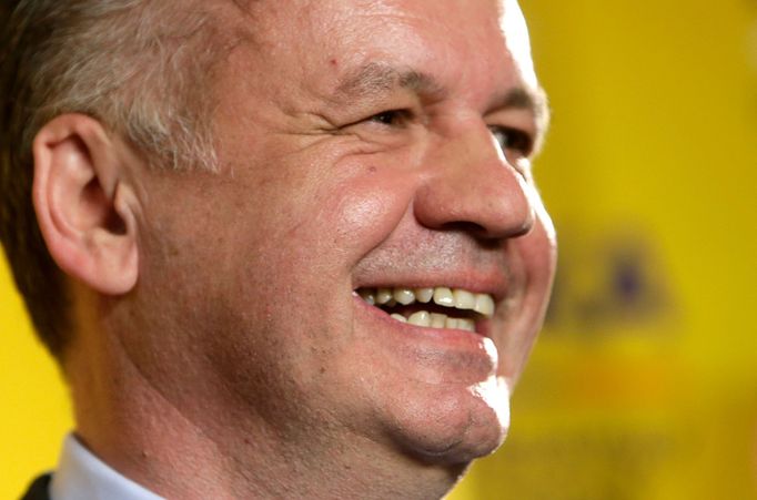 Nový slovenský prezident Andrej Kiska se raduje z vítězství ve volbách. (29. března 2014)