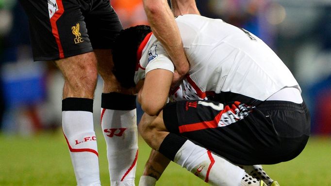 Liverpool's Gerrard and Suarez react following their English Premier League soccer match against Crystal Palace at Selhurst Park in London