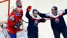 Slovakia's Tomas Tatar (C) celebrates his goal against Norway with team mate Radoslav Tybor (R) during the first period of their men's ice hockey World Championship group