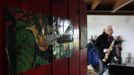 Artist and poet Barry Edgar Pilcher, age 69, plays the clarinet in his cottage on the Island of Inishfree in County Donegal May 1, 2012. Pilcher is the only inhabitant of the island on which he has lived for the past 20 years. He only leaves the island once a week to collect his pension and buy groceries on the mainland. REUTERS/Cathal McNaughton (IRELAND - Tags: ENTERTAINMENT SOCIETY) Published: Kvě. 2, 2012, 11:05 dop.