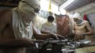 Filipino gunsmiths work in an illegal makeshift gun factory on the outskirts of Danao in central Philippines July 8, 2012. In the Philippines, they vote with their trigger fingers. Elections mean big business for illegal gunsmiths, who are looking forward to 2013 mid-term polls. With election-related violence commonplace, the Philippines imposes a ban on the carrying of guns for six months, from campaigning to the proclamation of winners. Picture taken July 8, 2012. To match Feature PHILIPPINES-GUNS/ REUTERS/Erik De Castro (PHILIPPINESREUTERS/Erik De Castro (PHILIPPINES - Tags: SOCIETY POLITICS BUSINESS CRIME LAW) Published: Čec. 29, 2012, 2:29 dop.