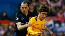 Barcelona's Sergi Roberto in action with Atletico's Diego Godin